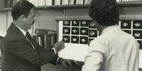 Carl Olsson, MD, reviewing CT scans with resident